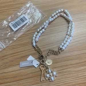 Chico’s faux pearl necklace with charms. NWT